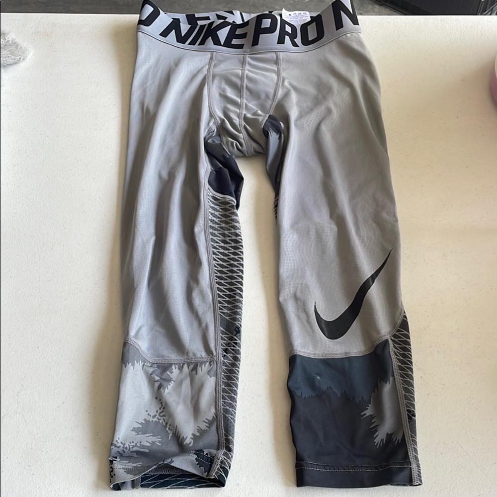 Nike Gray/ Black Compression Leggings small holes shown in pic